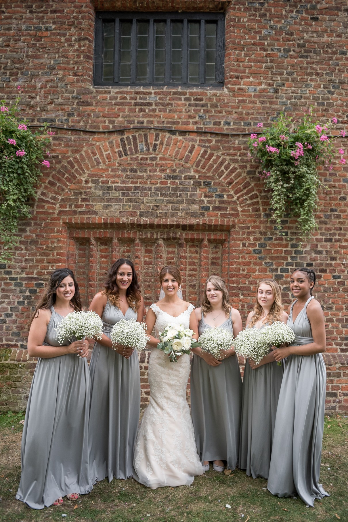 Wedding photography at Tudor Barn in Eltham - bride and bridesmaids